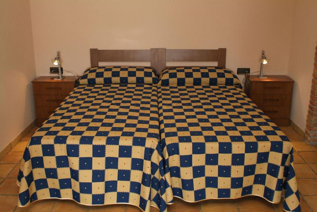 Posteľ alebo postele v izbe v ubytovaní La Candelera
