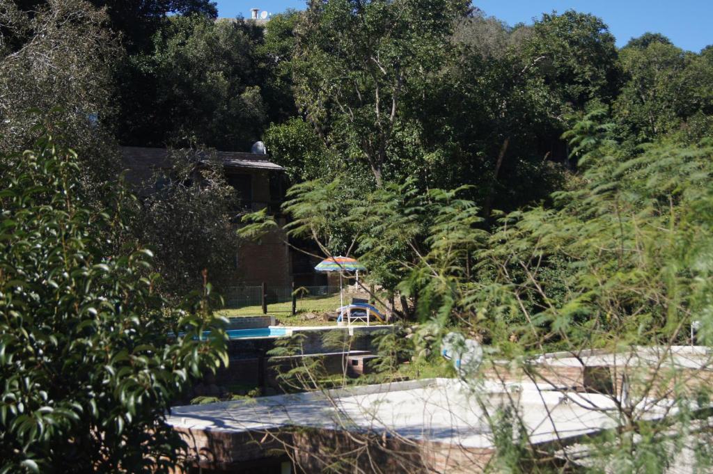 Una vista de la pileta en Acasi - Cabañas de Descanso o alrededores