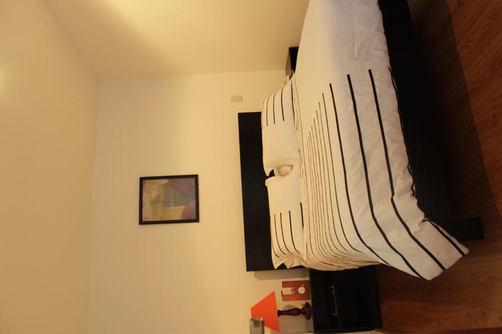 Postel nebo postele na pokoji v ubytování Hotel Real Estación