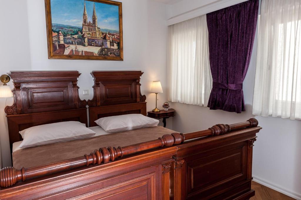 Postel nebo postele na pokoji v ubytování Main Square penthouse