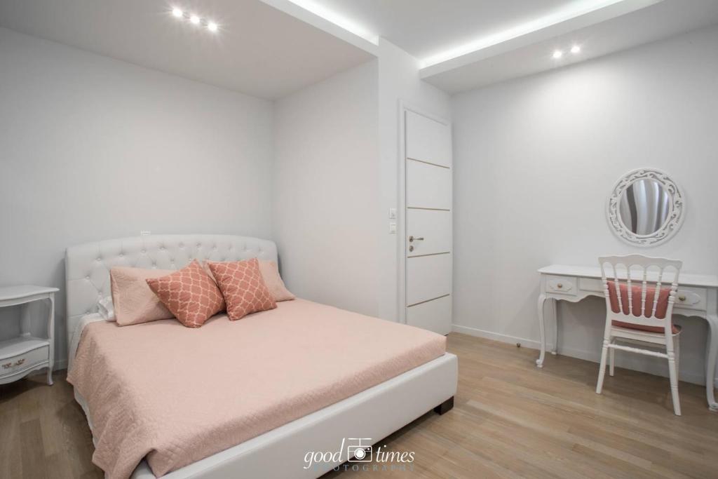 Voodi või voodid majutusasutuse Pineapple Seaside Suite toas