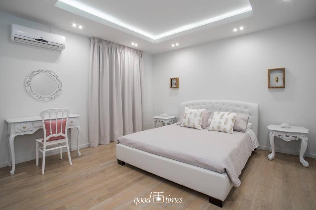 Voodi või voodid majutusasutuse Pineapple Seaside Suite toas