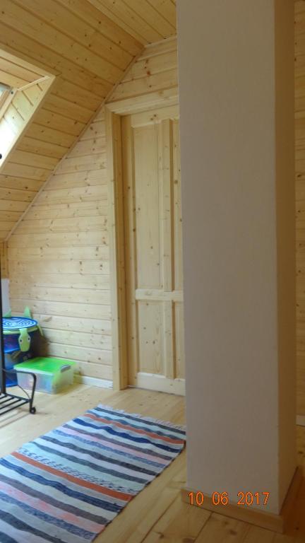 Postel nebo postele na pokoji v ubytování Chaloupka za potůčkem