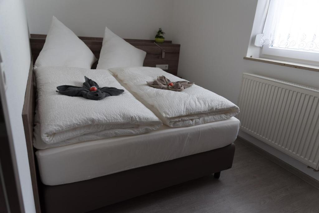 Postel nebo postele na pokoji v ubytování FrankenFeWo