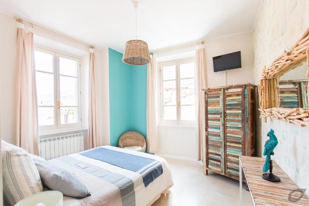 Posteľ alebo postele v izbe v ubytovaní B&B La Sosta degli Artisti