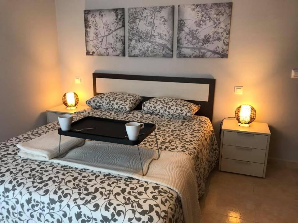 Postel nebo postele na pokoji v ubytování Villa Isla Feliz