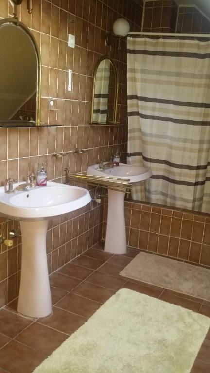 Kúpeľňa v ubytovaní Horváth Apartmanház