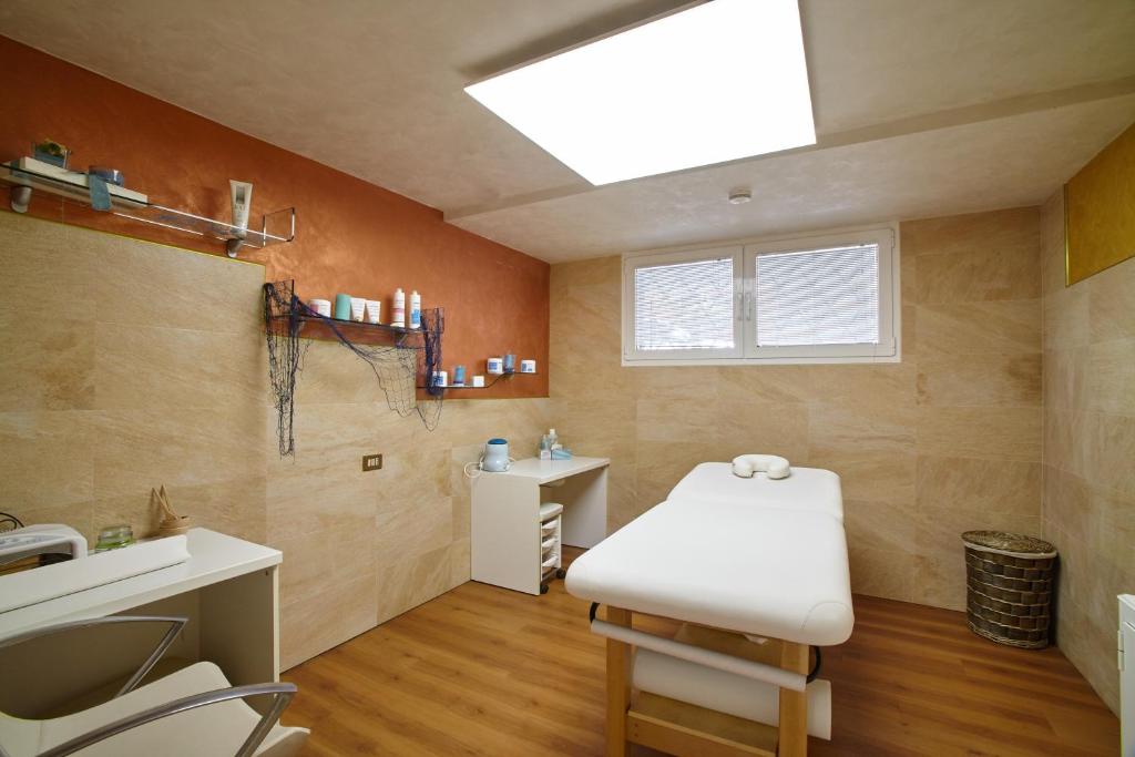 Kúpele alebo wellness v ubytovaní Hotel Helen