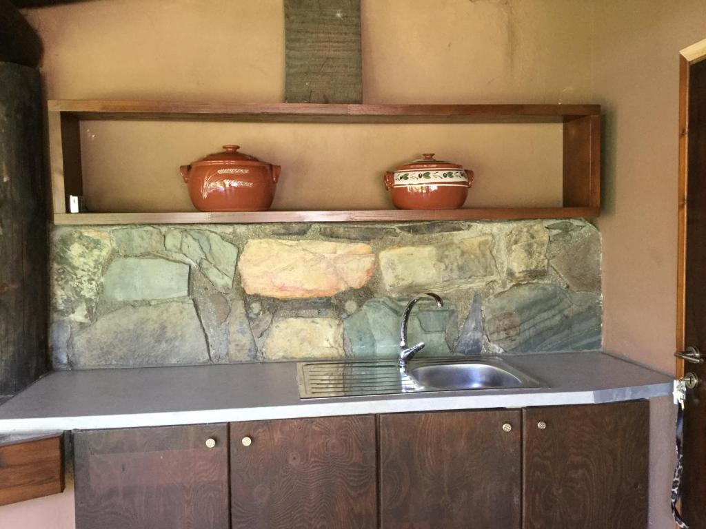 Kuchyň nebo kuchyňský kout v ubytování Villa Casa Avocado