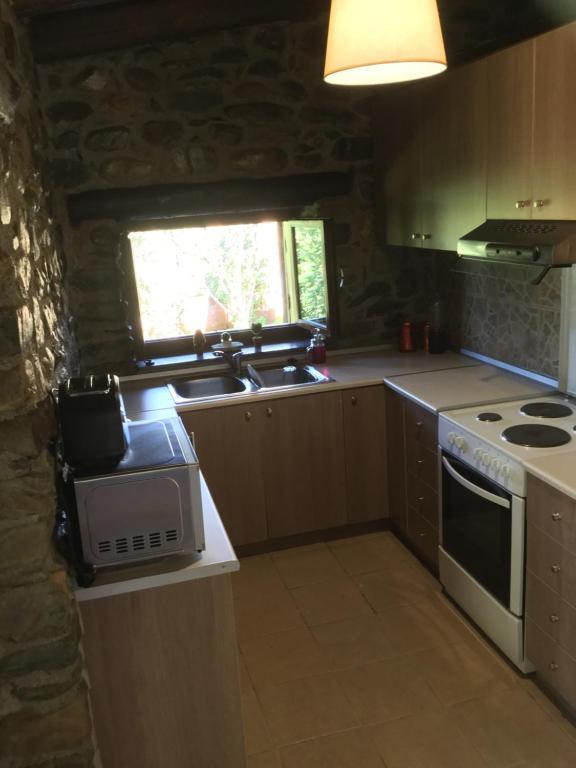 Kuchyň nebo kuchyňský kout v ubytování Villa Casa Avocado