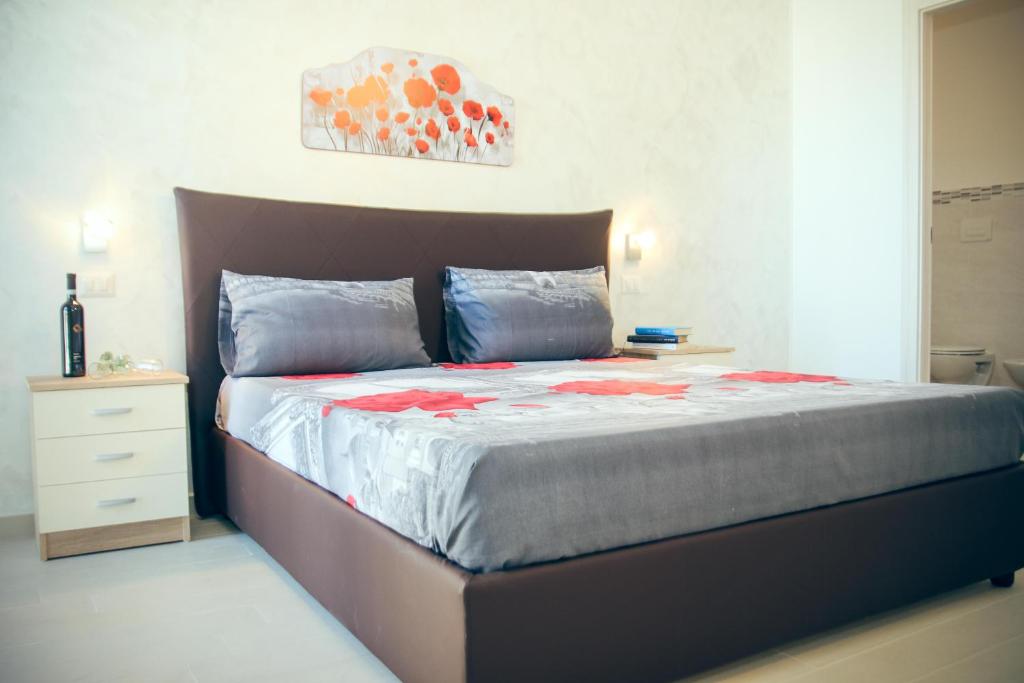 Postel nebo postele na pokoji v ubytování Il Sorriso B&B