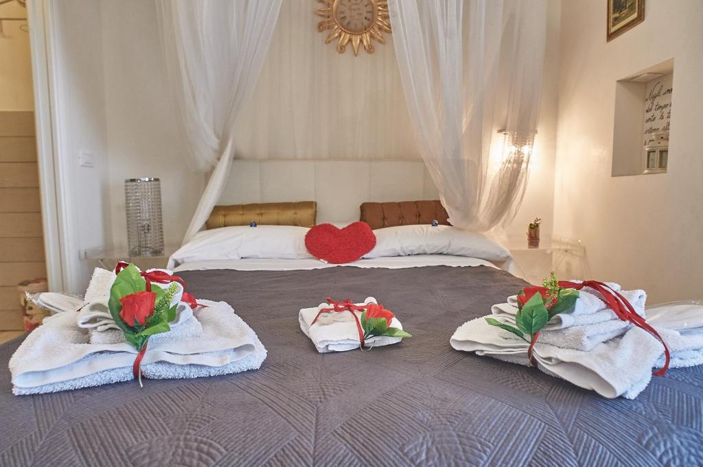 Postel nebo postele na pokoji v ubytování Abbraccio di Romeo
