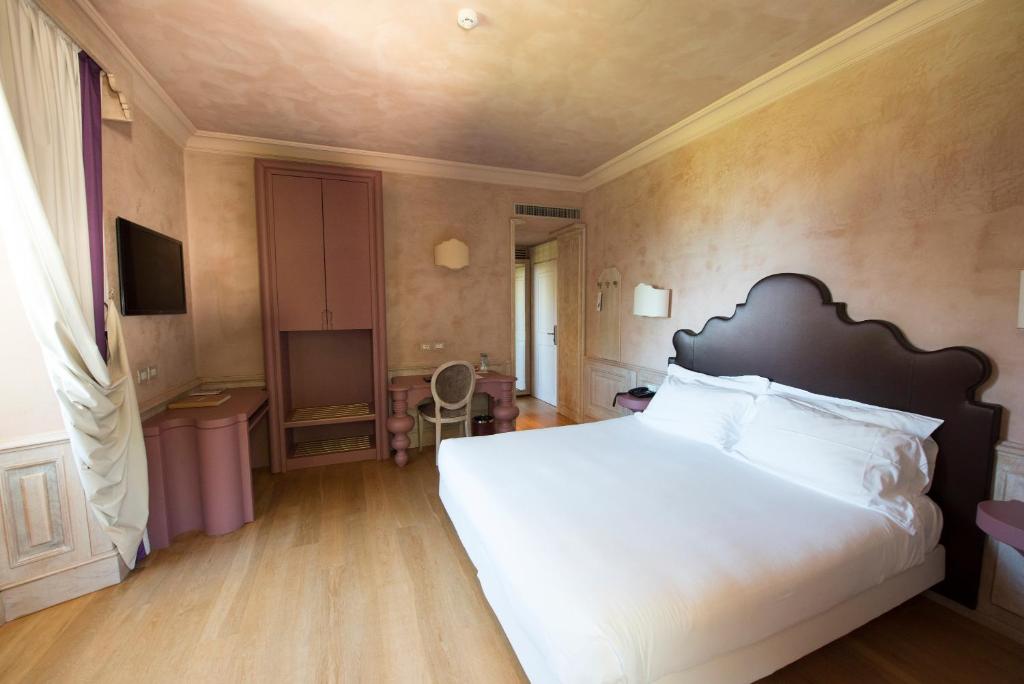 Postel nebo postele na pokoji v ubytování Villa Lattanzi