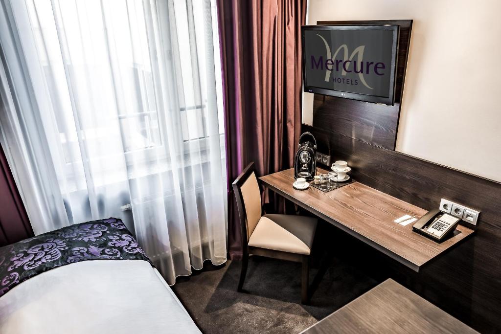 Cama ou camas em um quarto em Mercure Frankfurt City Messe