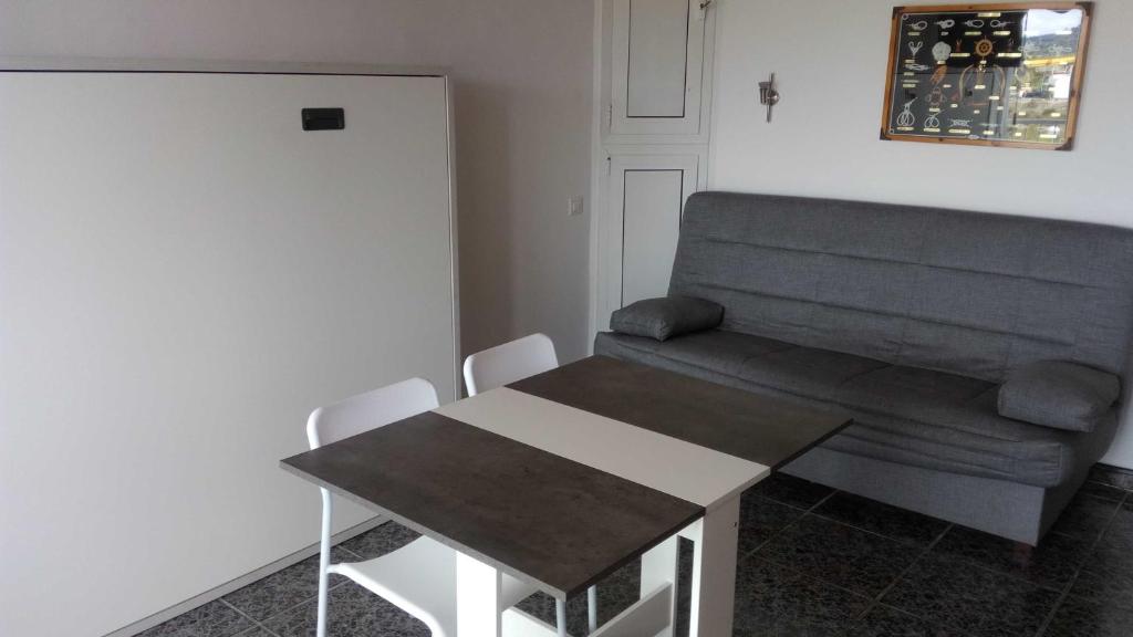 Posezení v ubytování R&G Pineda Apartamento