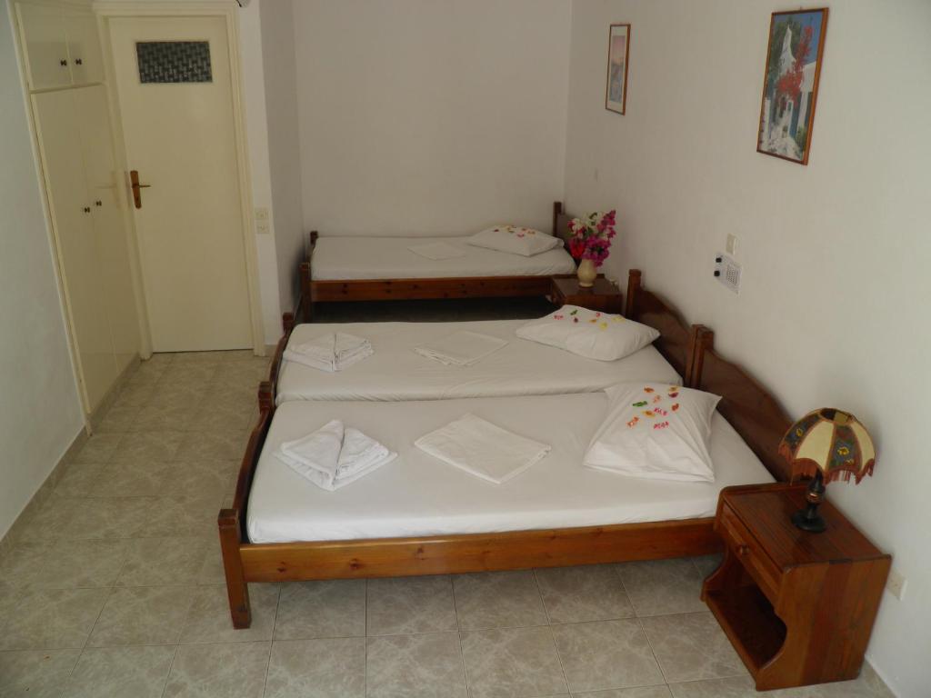 Postel nebo postele na pokoji v ubytování Levante Beach Hotel