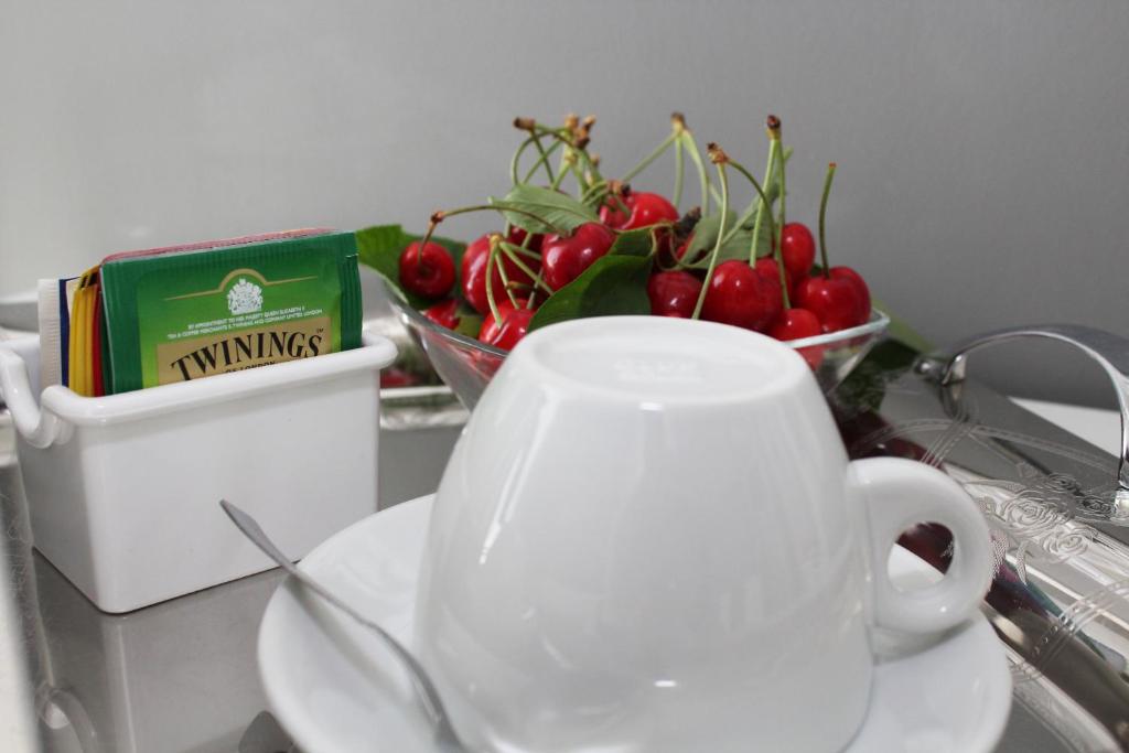 Příslušenství pro přípravu čaje a kávy v ubytování B&B In Centro