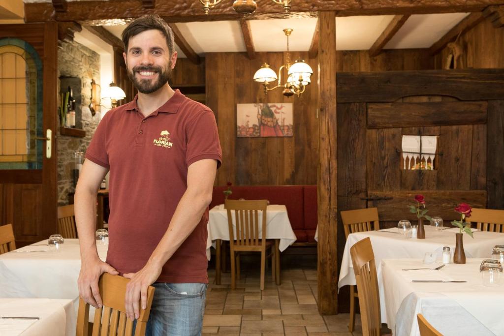 Un restaurante o sitio para comer en Hotel Florian