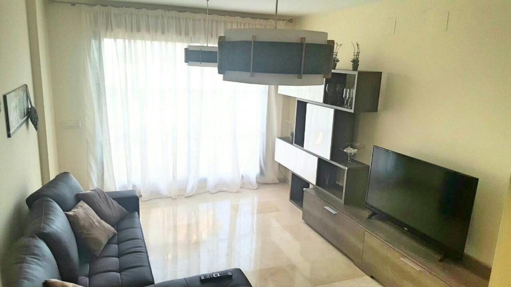 TV a/nebo společenská místnost v ubytování Luxyry apartament Benidorm