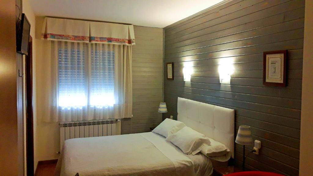 Postel nebo postele na pokoji v ubytování Hostal Martin - Sanabria