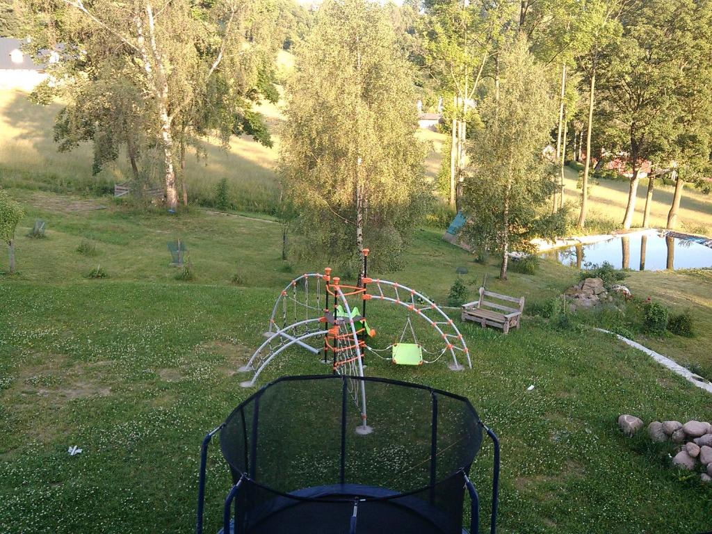 an aerial view of a playground in a park at Apartmány Kuřátko in Benecko