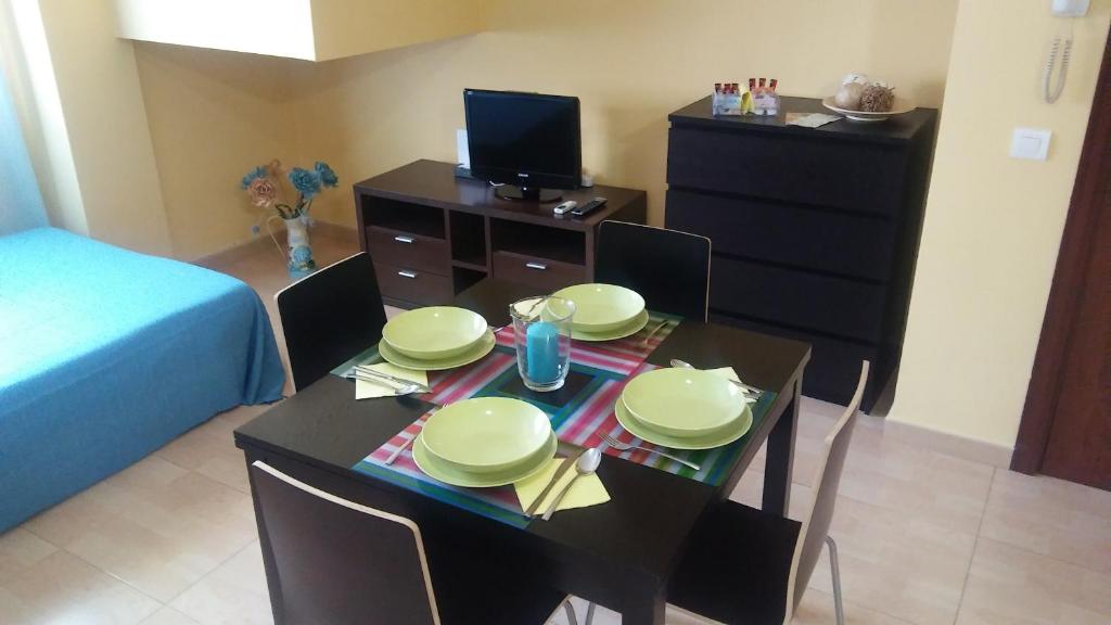 Telewizja i/lub zestaw kina domowego w obiekcie Apartamento Domingo Lozano