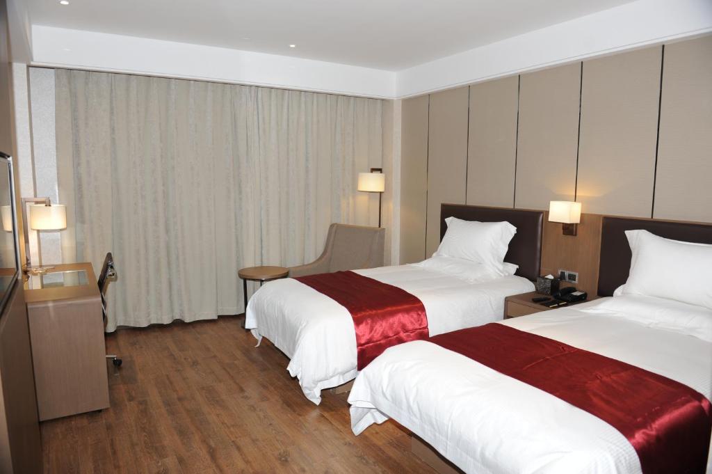 Postel nebo postele na pokoji v ubytování Atour X Hotel Shanghai Hongqiao Airport Konggang Road