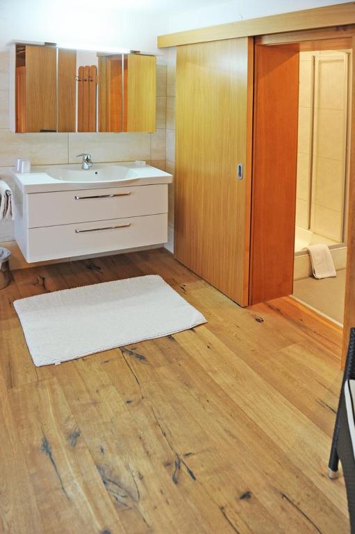 Postel nebo postele na pokoji v ubytování Pension Olympia