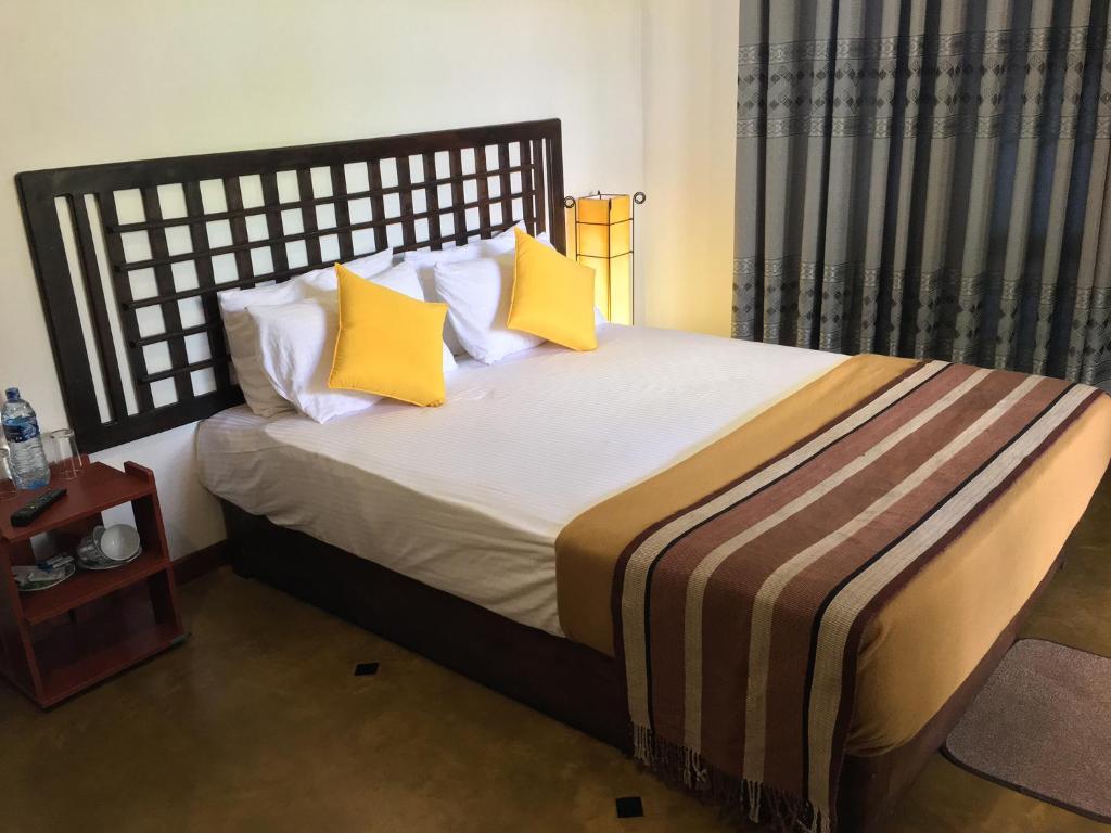 Postel nebo postele na pokoji v ubytování Hotel Gala Addara