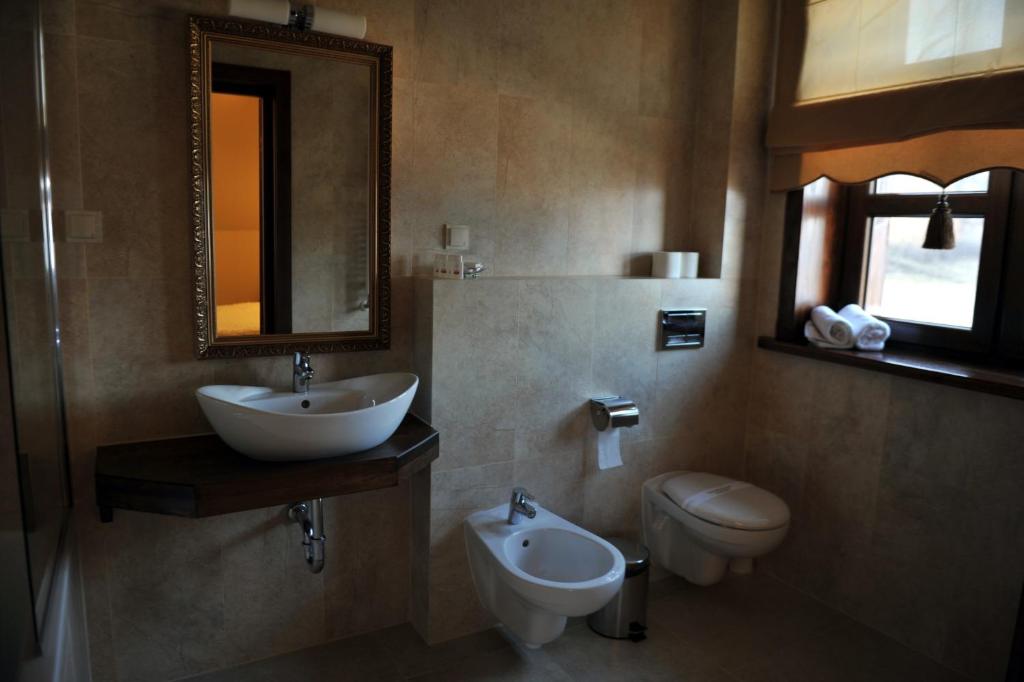 Koupelna v ubytování Hotel Chutor Kozacki