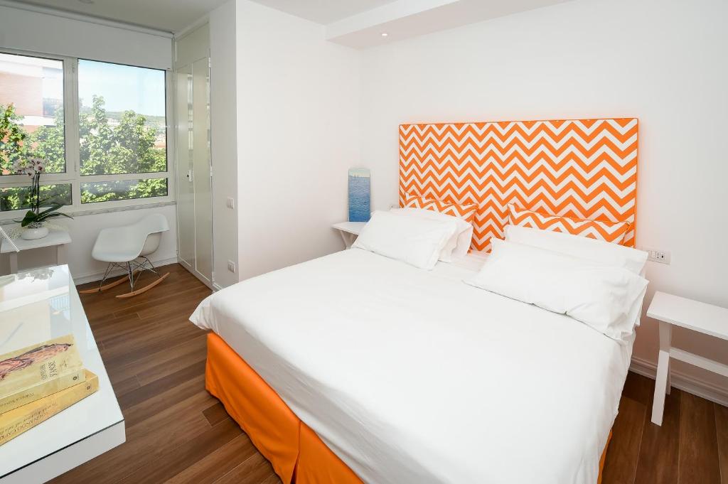 Postel nebo postele na pokoji v ubytování Casa Pantone