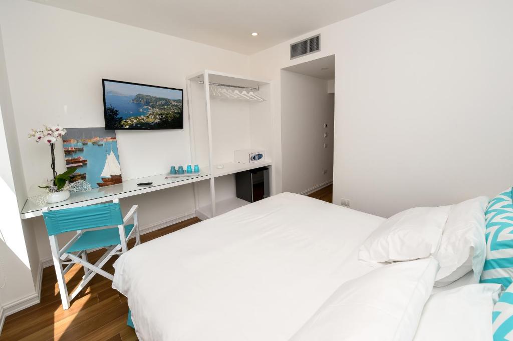 Postel nebo postele na pokoji v ubytování Casa Pantone