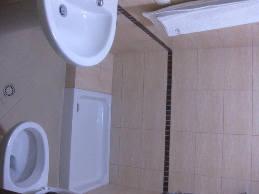 Ein Badezimmer in der Unterkunft Hotel Marub