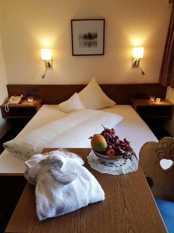 Postel nebo postele na pokoji v ubytování Sporthotel Pechtl