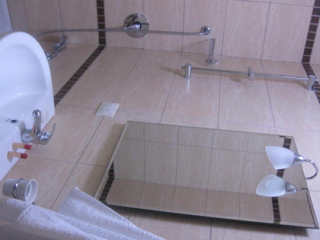 Ein Badezimmer in der Unterkunft Hotel Marub