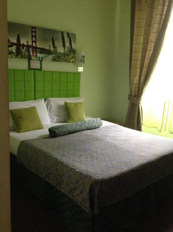 A bed or beds in a room at B&B Meret