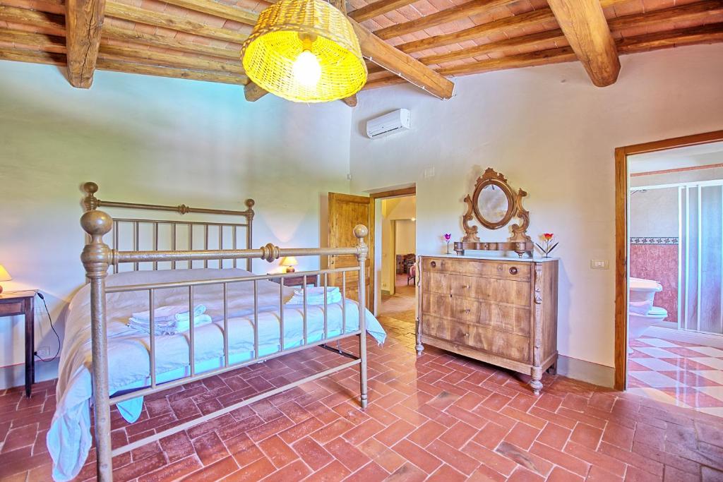Posteľ alebo postele v izbe v ubytovaní Casa Scopeti by PosarelliVillas