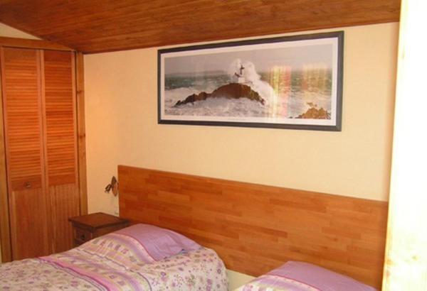 Cama ou camas em um quarto em Chambres d&#39;H&ocirc;tes La Forterie