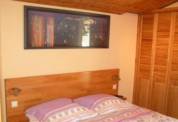 Cama ou camas em um quarto em Chambres d&#39;H&ocirc;tes La Forterie
