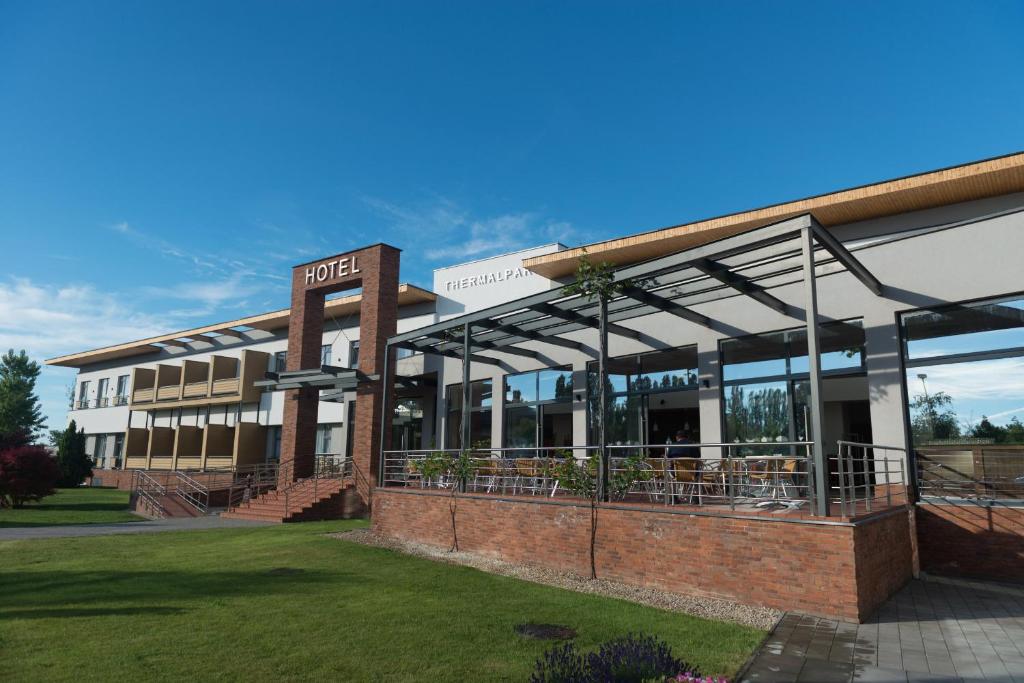 a building with a sign that reads hotel at Hotel Thermalpark in Dunajská Streda