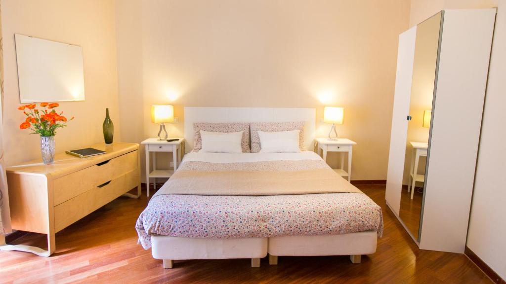 Postel nebo postele na pokoji v ubytování Hotel Martino Ai Monti