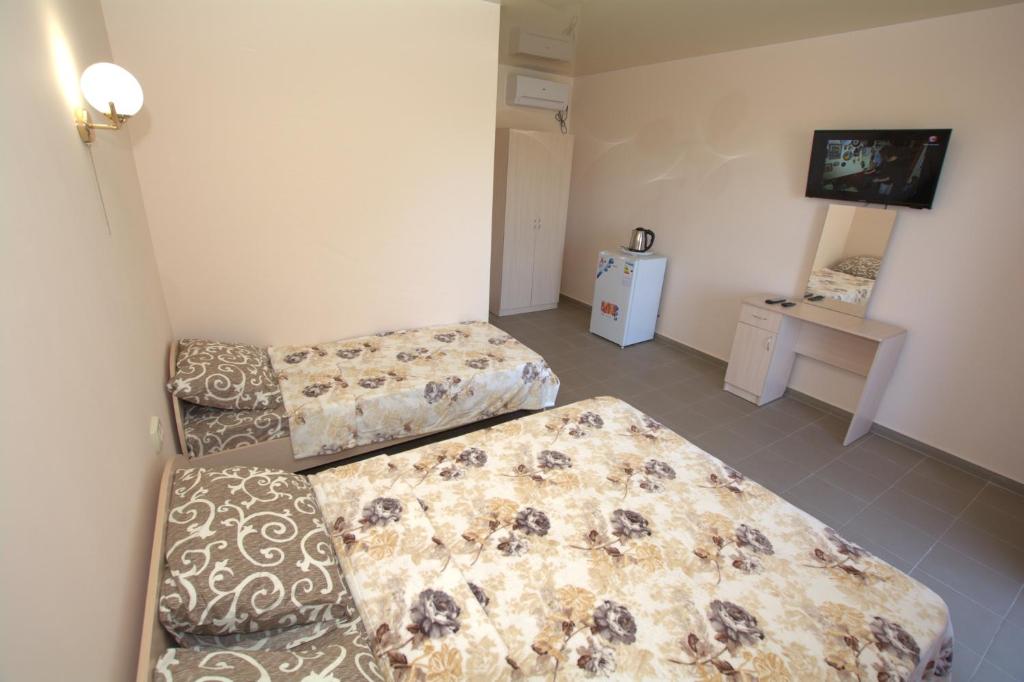 Postel nebo postele na pokoji v ubytování Sofia Hotel