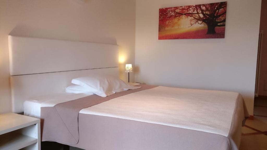 Postel nebo postele na pokoji v ubytování Marco Polo