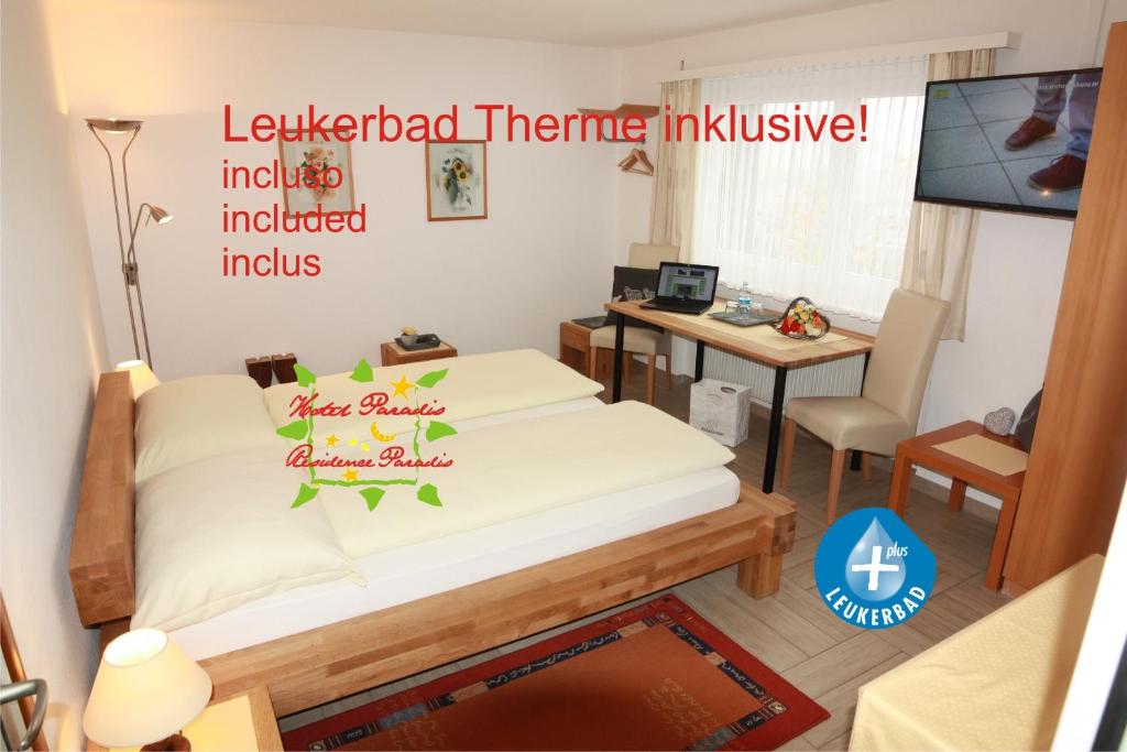 Televisor o centre d'entreteniment de Hotel Paradis-Leukerbad-Therme