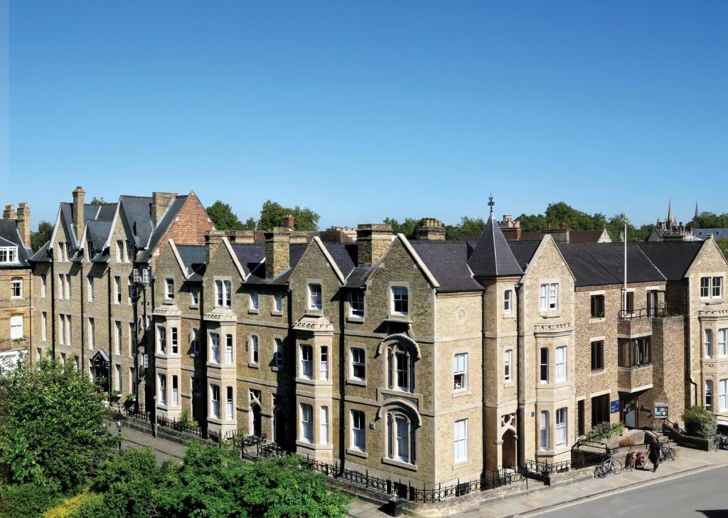 a row of houses on a city street at Rewley House University of Oxford in Oxford