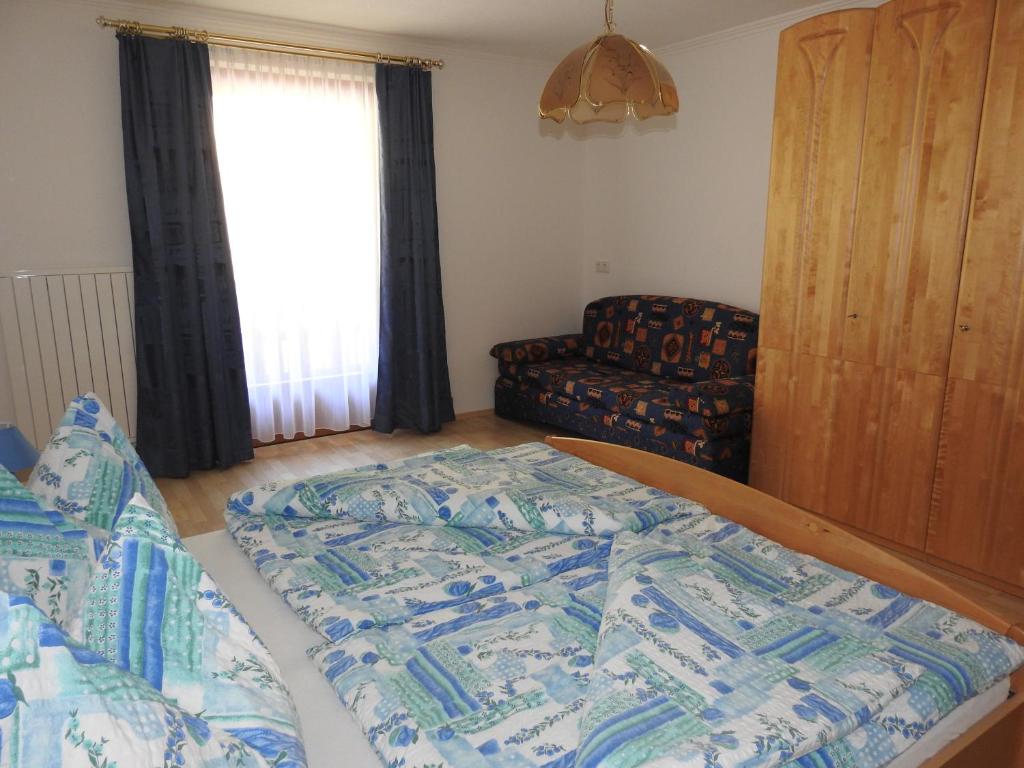 Postel nebo postele na pokoji v ubytování Haus Strieder