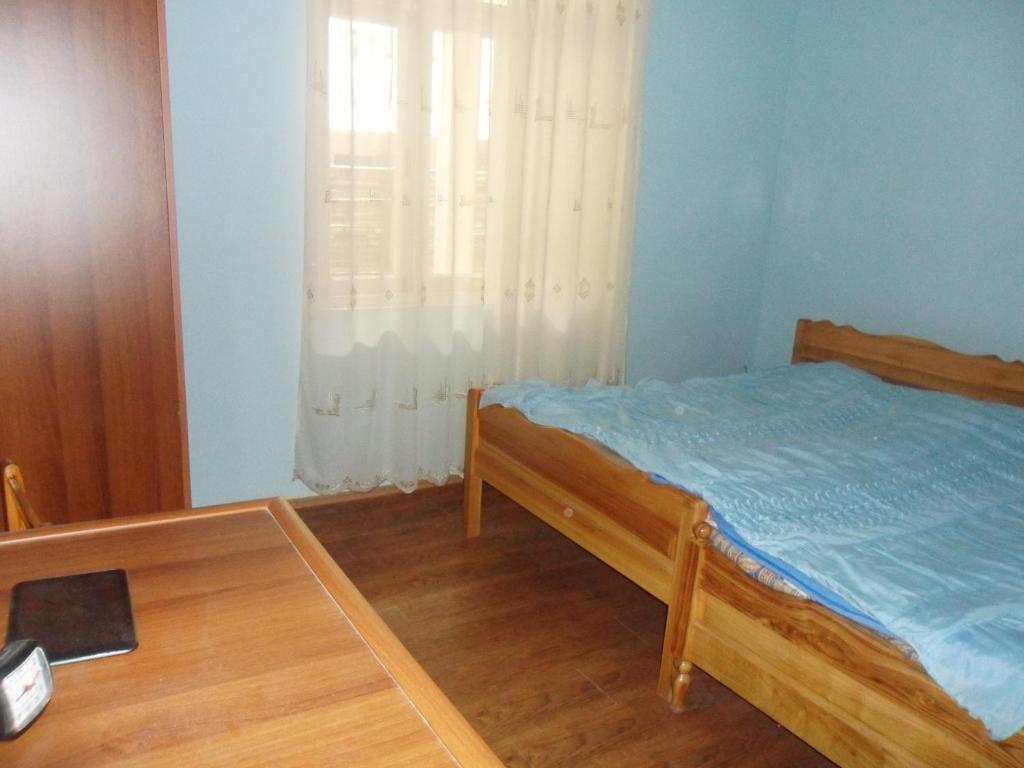 Postel nebo postele na pokoji v ubytování Guest House Nika