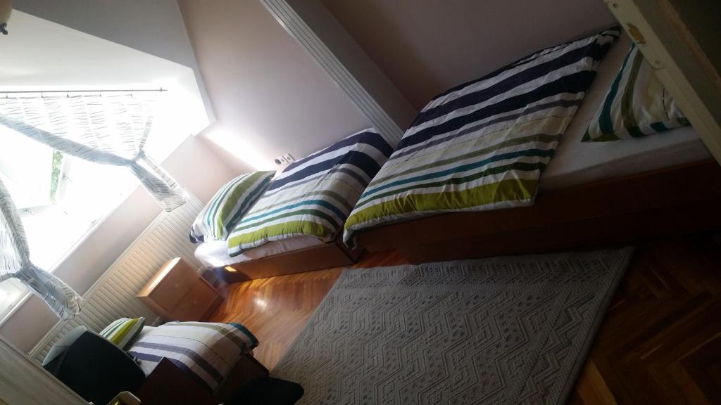 Posteľ alebo postele v izbe v ubytovaní Horváth Apartmanház