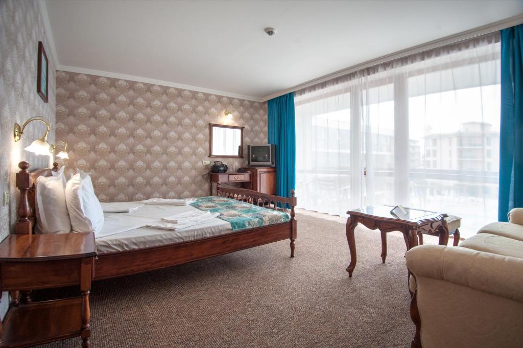 Postel nebo postele na pokoji v ubytování Mercury Hotel-Premium All Inclusive