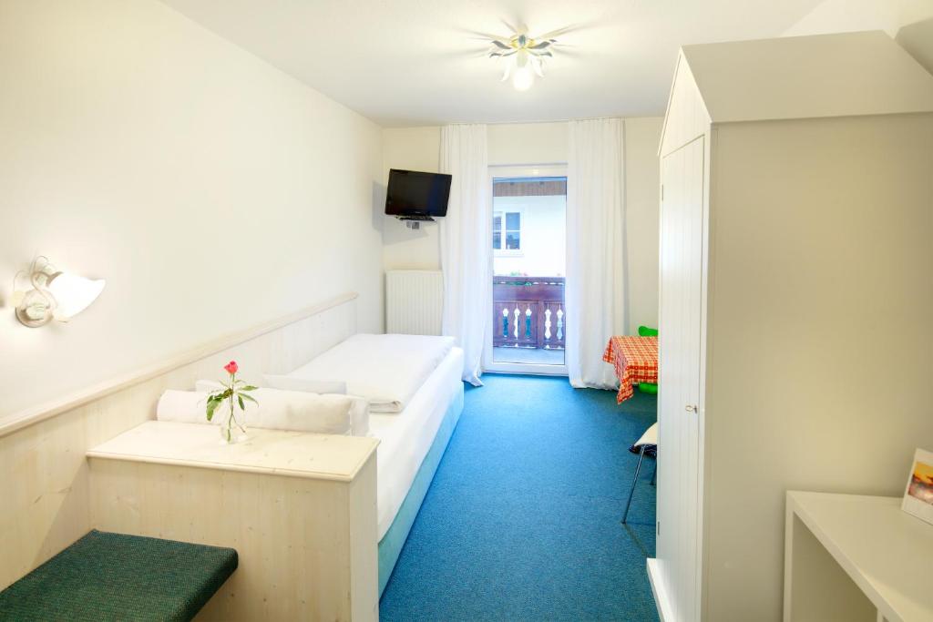 Postel nebo postele na pokoji v ubytování Hotel Kleiner König